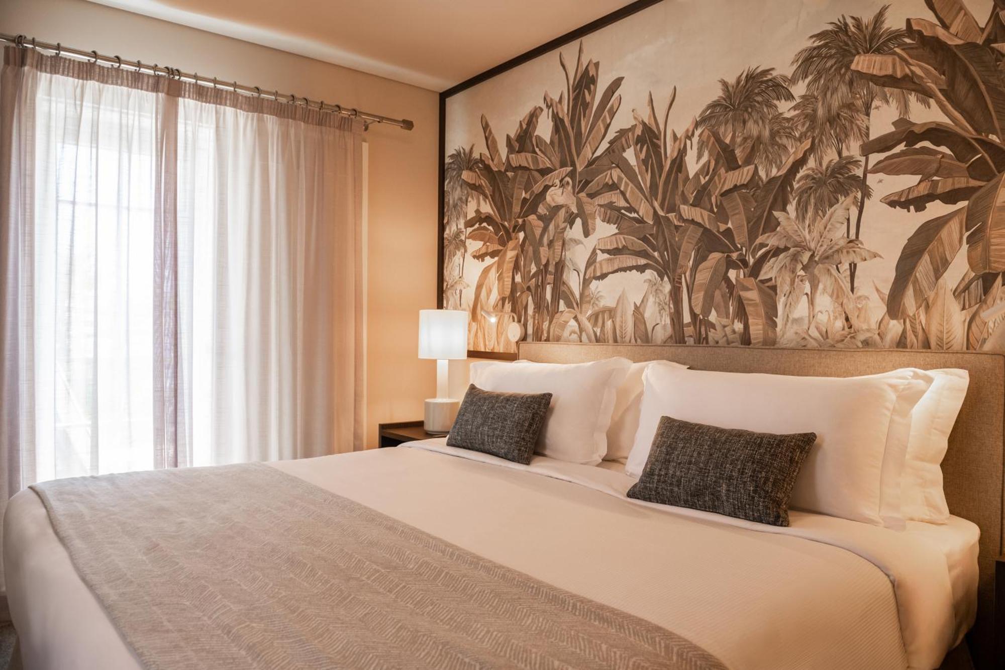 Domes Lake Algarve, Autograph Collection Vilamoura Bagian luar foto A bedroom at the hotel